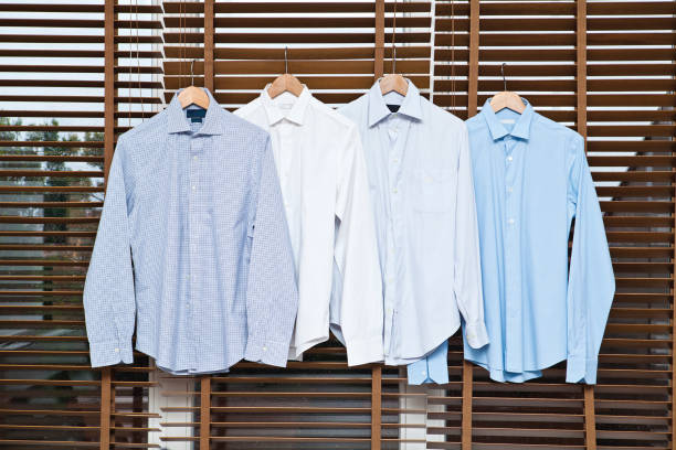 camicie - shirt hanger hanging blue foto e immagini stock