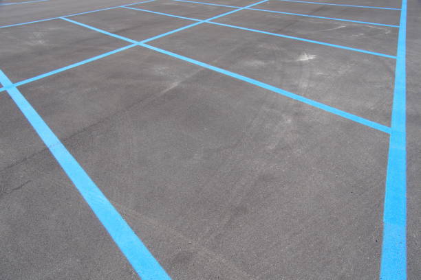 istock Freshly paved in painted parking lot. 836347970