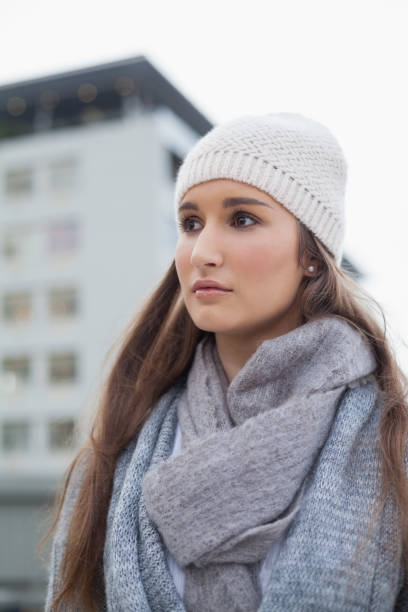 istock Thoughtful gorgeous woman with winter clothes on posing 836364580