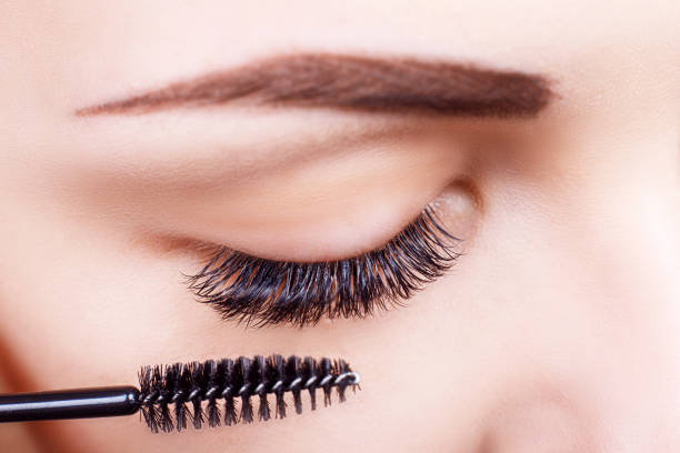 istock Eyelash Extension Procedure. Woman Eye with Long Eyelashes. Lashes, close up, macro, selective focus 836364910