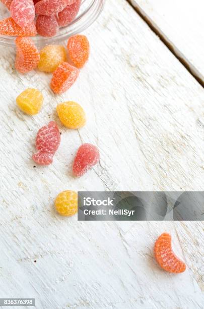 Vitamins Gummy Spilled From The Bottle Stock Photo - Download Image Now - Gummy Candy, Vitamin, Nutritional Supplement