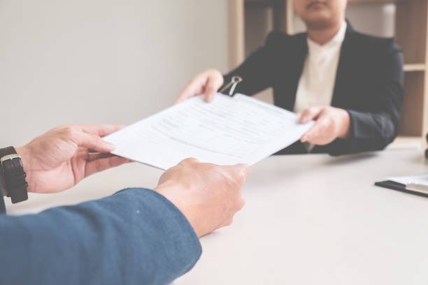 istock Interview  about to sign a legal document which would be a binding mutual agreement 836377128