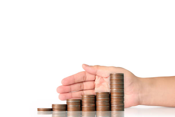 istock money growing from coins in hand 836390518