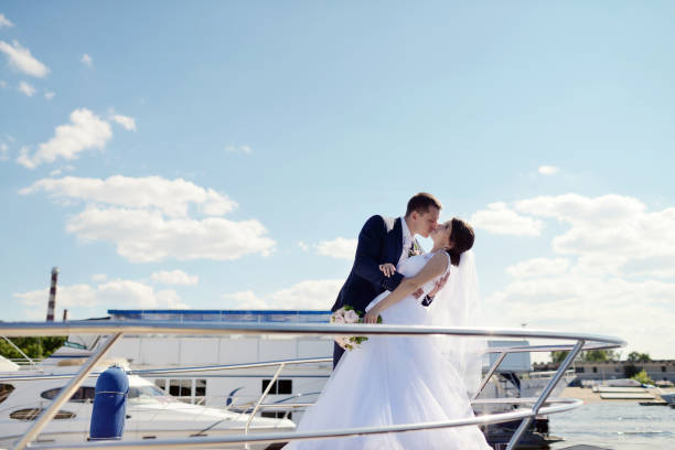 istock Wedding couple is hugging on a yacht 836390524