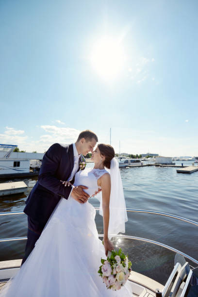 istock Wedding couple is hugging on a yacht 836390632