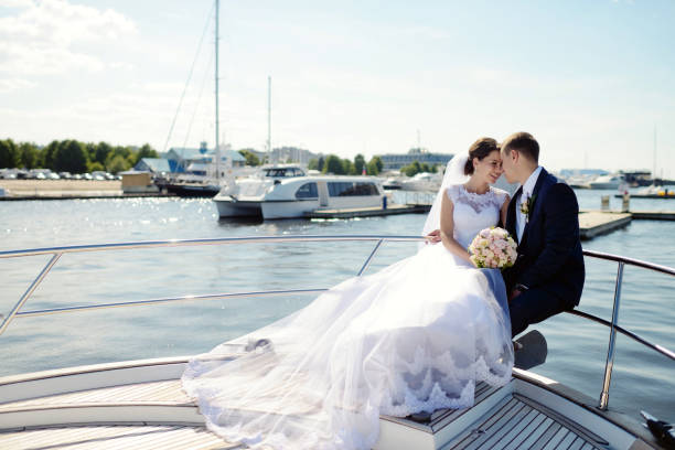istock Wedding couple is hugging on a yacht 836390676