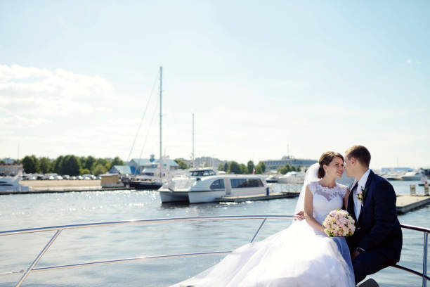 istock Wedding couple is hugging on a yacht 836390768