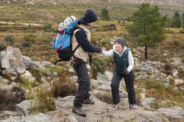istock Couple on a hike at rocky landscape 836391328