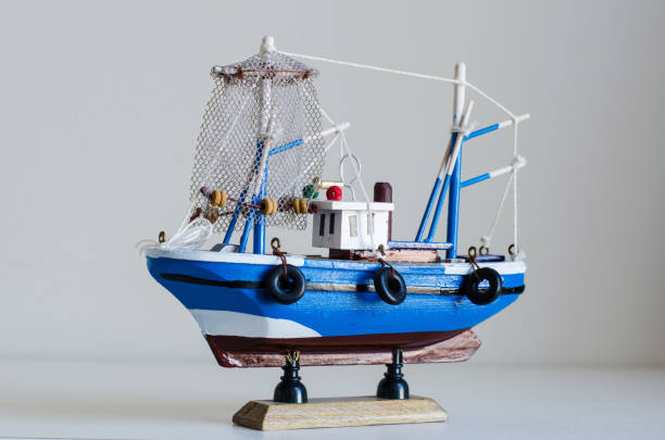 istock Toy fishing boat with white background 836394964