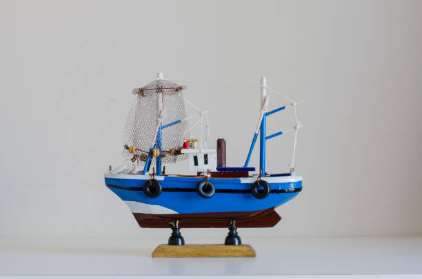 istock Toy fishing boat with white background 836394966