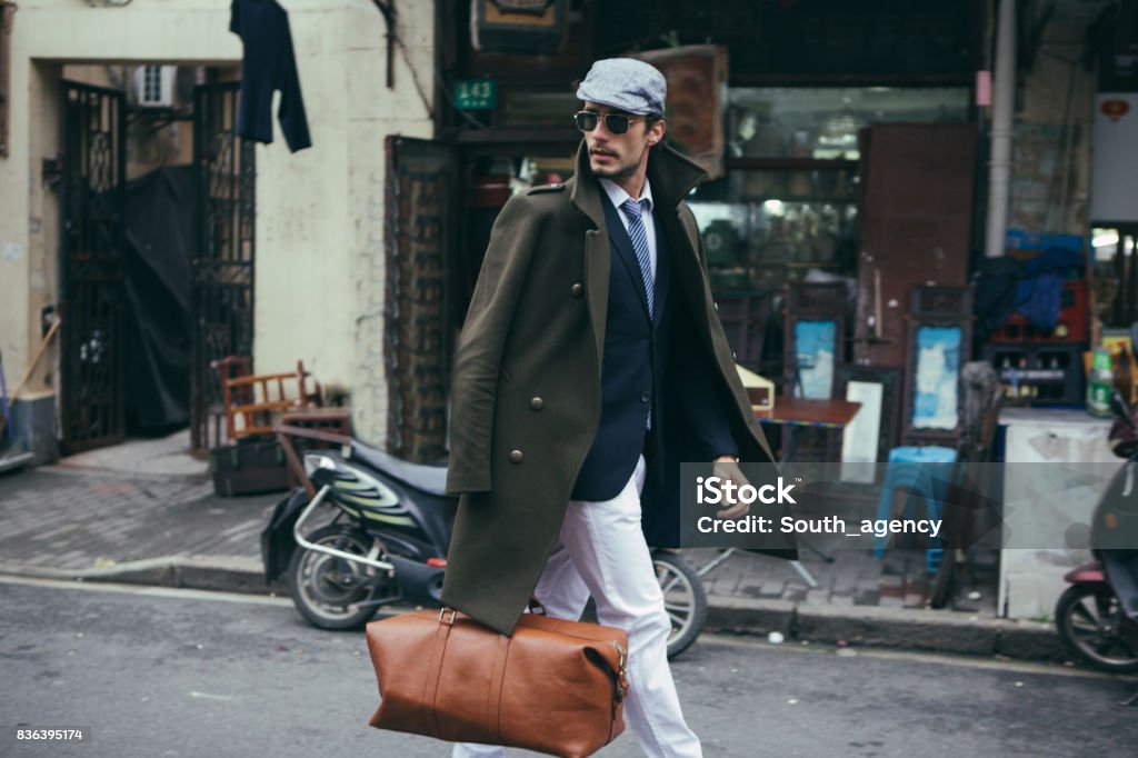 Gentleman With A Bag Stock Photo - Download Image Now - Men, Bag, Suit -  iStock