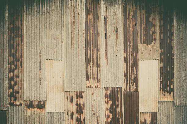 istock Old rusty corrugated tin zinc metal wall in vintage tone. 836401590