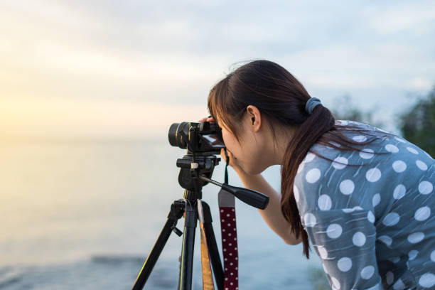 istock photographer woman seascape 836402996