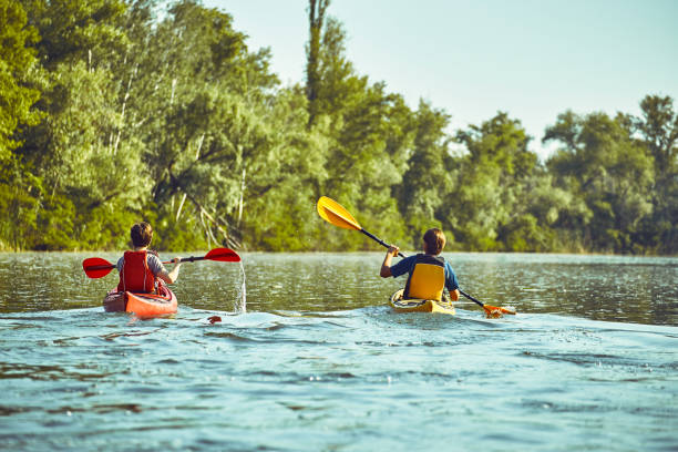 istock A canoe trip along the river along the forest in summer. 836403126