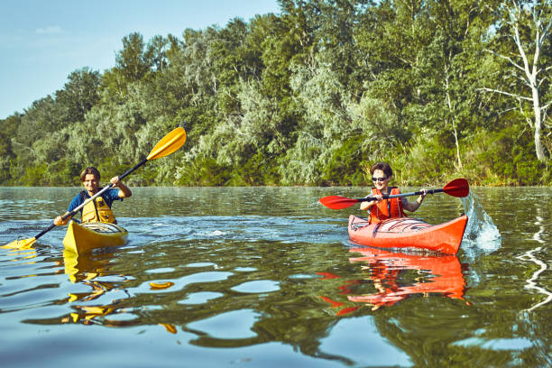 istock A canoe trip along the river along the forest in summer. 836403130