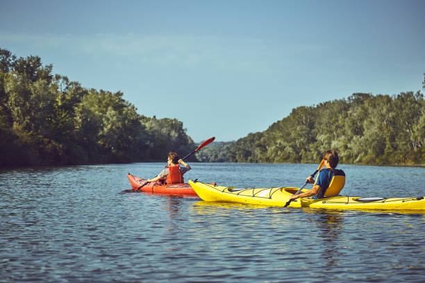 istock A canoe trip along the river along the forest in summer. 836403188