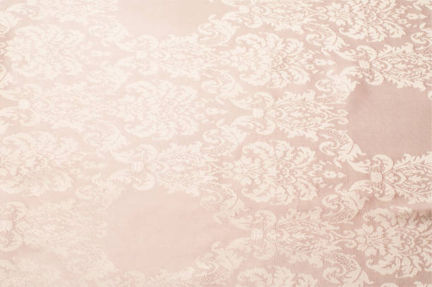 istock The texture of the silk fabric of beige with small white pattern 836414956
