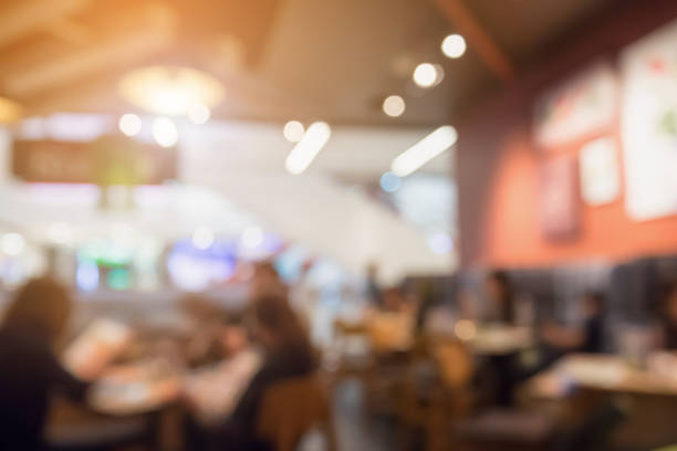 istock People in restaurant cafe interior with bokeh light blurred customer abstract background 836417870