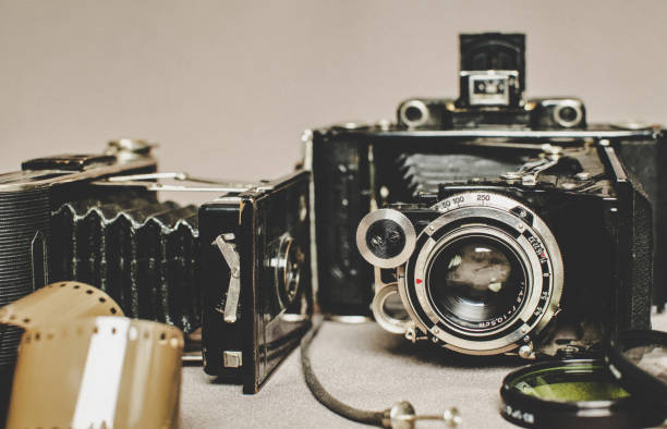 istock Old vintage retro camera still life on fabric background close up 836418568