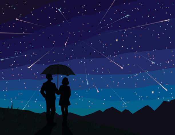 istock Starfall. Silhouette of couple under umbrella, watching falling stars. 836422454
