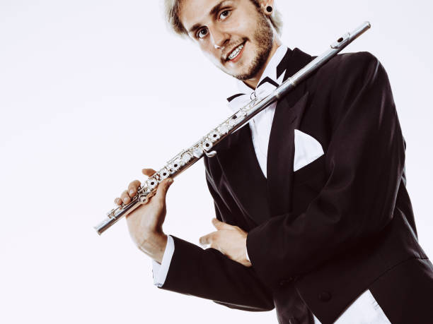 istock Male flutist wearing tailcoat holds flute 836426382