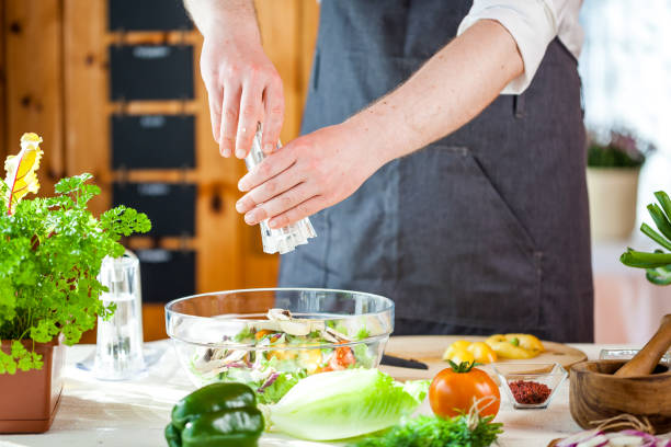 istock Chef cutting fresh and delicious vegetables for salad 836430974