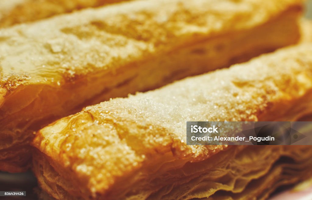 Puff pastry cakes with sugar powder close up Appetizer Stock Photo