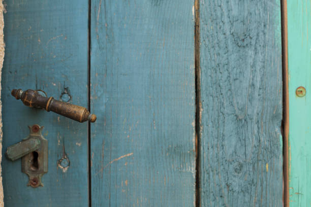 istock Old door with lock, Old wood texture, Green background 836437138