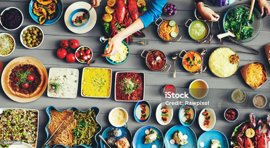 Diverse food on the table Food Festive Restaurant Party Unity Concept Fusion Food Stock Photo