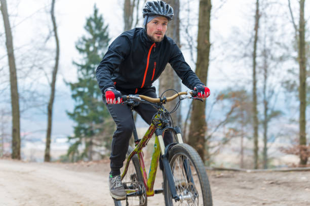 istock Mountain biker in the woods 836453828