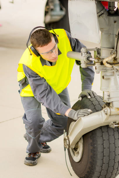 istock airport worker mechanic 836457254