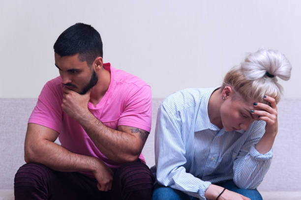 istock Unhappy couple sitting back to back 836458098