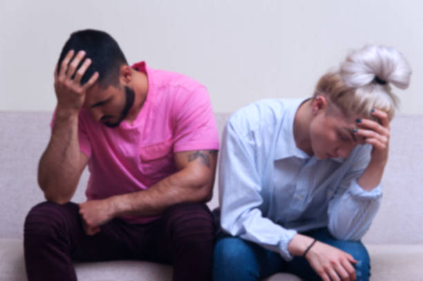 istock Unhappy couple sitting back to back 836458126