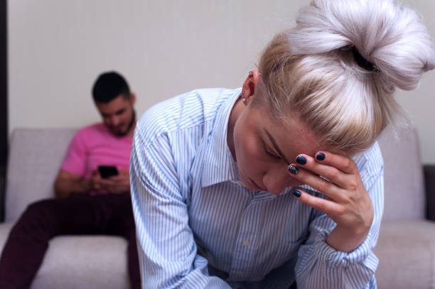 istock Upset young woman sitting separately after quarrel 836460630