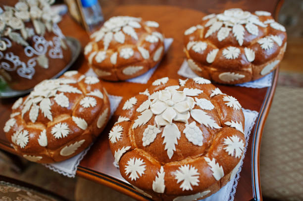 Close-up photo of tasty baked and decorated wedding bread.