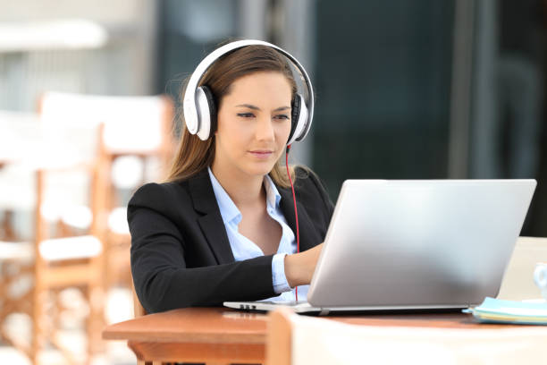 istock Executive watching video lecture in a coffee shop 836469264