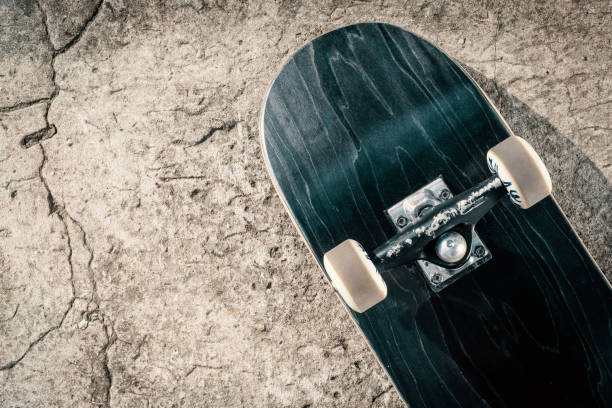 istock Skateboard on concrete floor in skatepark 836478592