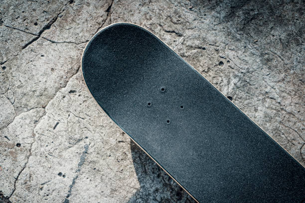 istock Skateboard on concrete floor in skatepark 836478854