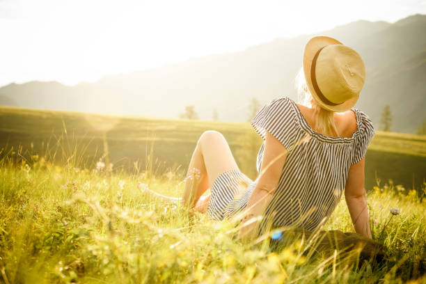 istock Woman watching the sunset. Serenity and relaxation. 836478960