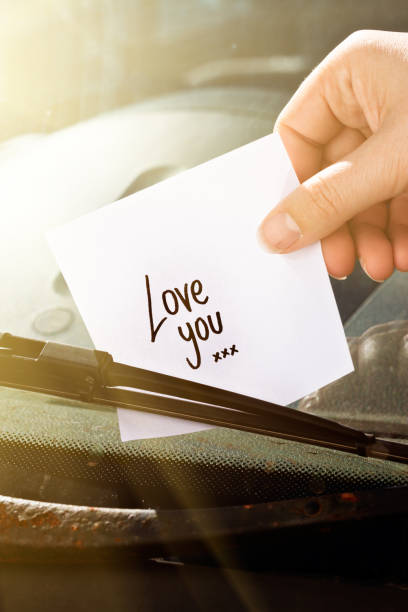istock Hand places note reading 