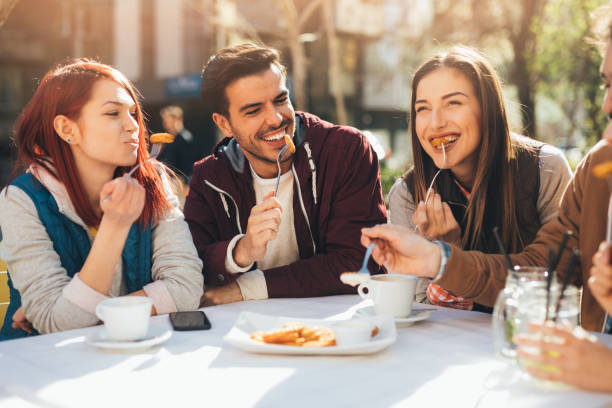 istock Friends eating at a restaurant 836486574
