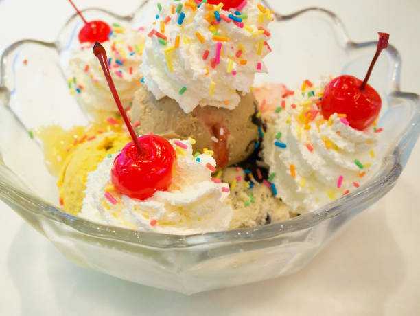 istock Ice cream scoops with whipped cream and cherry 836486666