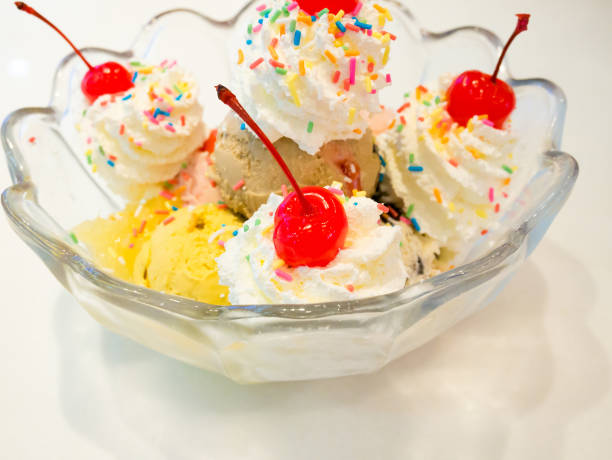 istock Ice cream scoops with whipped cream and cherry 836486670