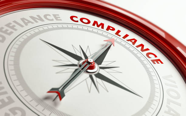 compliance concept: arrow of a compass pointing compliance text - compass symbol direction guide imagens e fotografias de stock