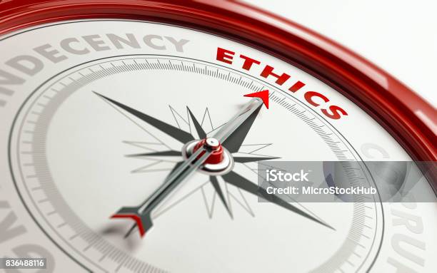 Ethics Concept Arrow Of A Compass Pointing Ethics Text Stock Photo - Download Image Now