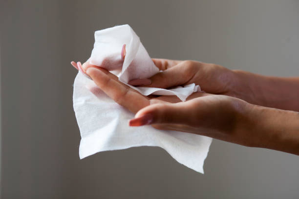 istock Hand with long nails clean with wet wipes 836488280