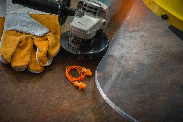 Close up safety equipment. Close up safety equipment,electric wheel grinding on wooden background. sliver of wood stock pictures, royalty-free photos & images