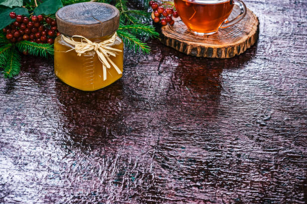 istock Deep purple background with honey and xmas decor 836494356