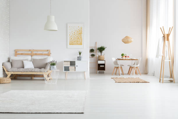 Apartment with living room White spacious apartment with minimalist nordic living room scandinavian descent photos stock pictures, royalty-free photos & images