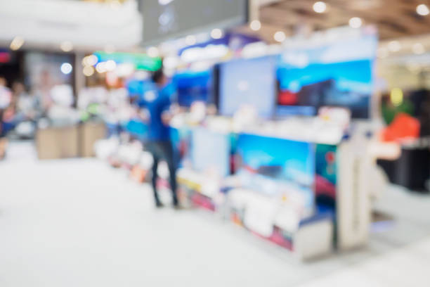 istock Television shelf in eletronic department store blurred background 836495538